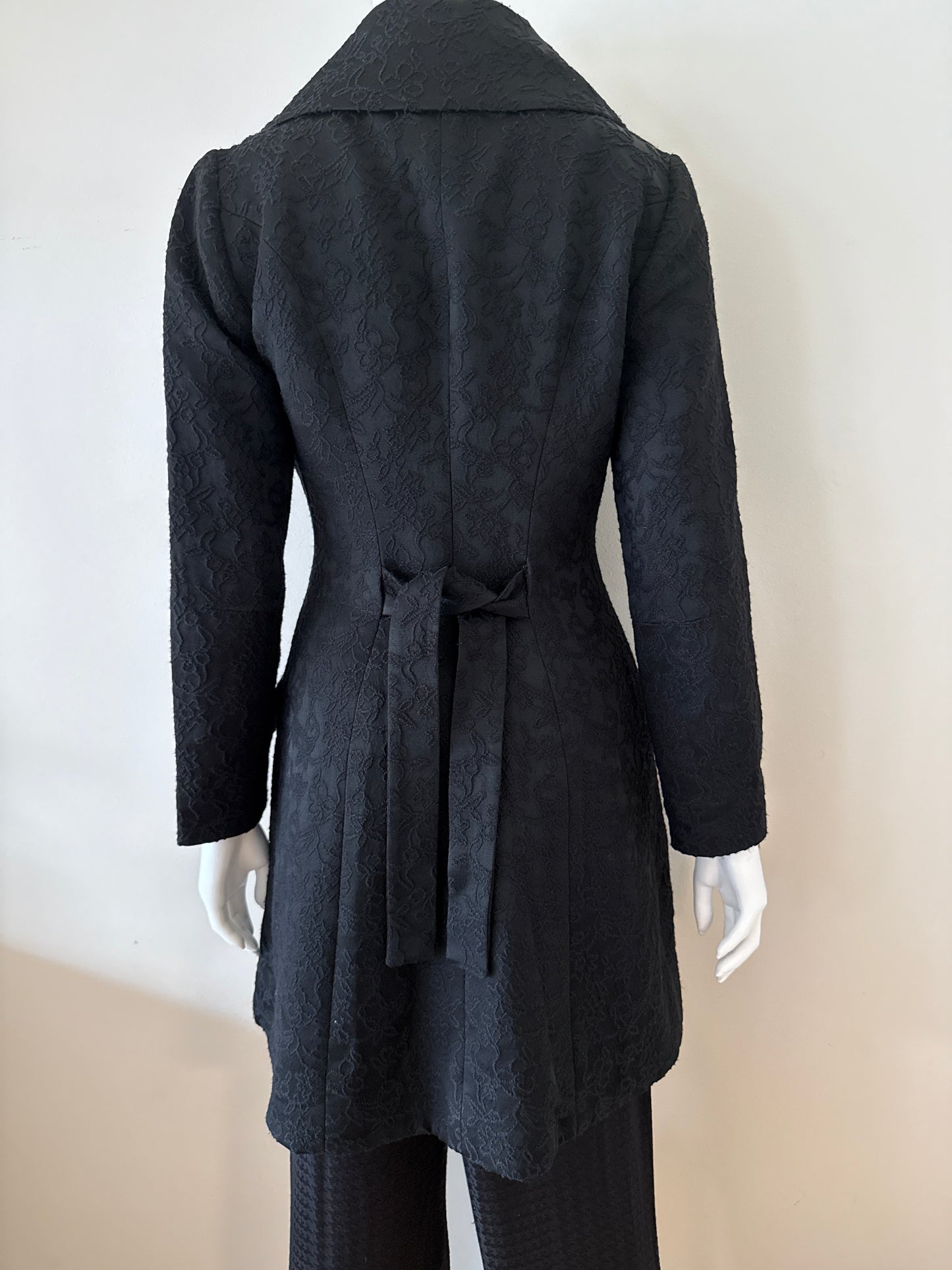Christopher Graf black coat